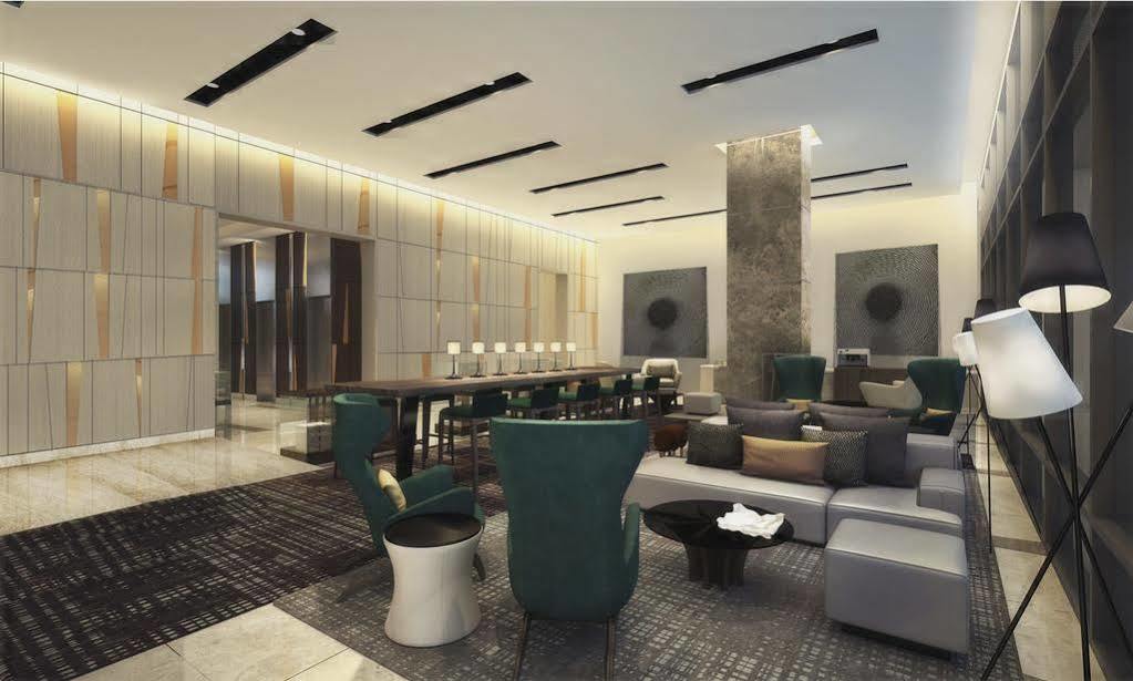 Seda Vertis North Quezon City Extérieur photo The lobby of the hotel